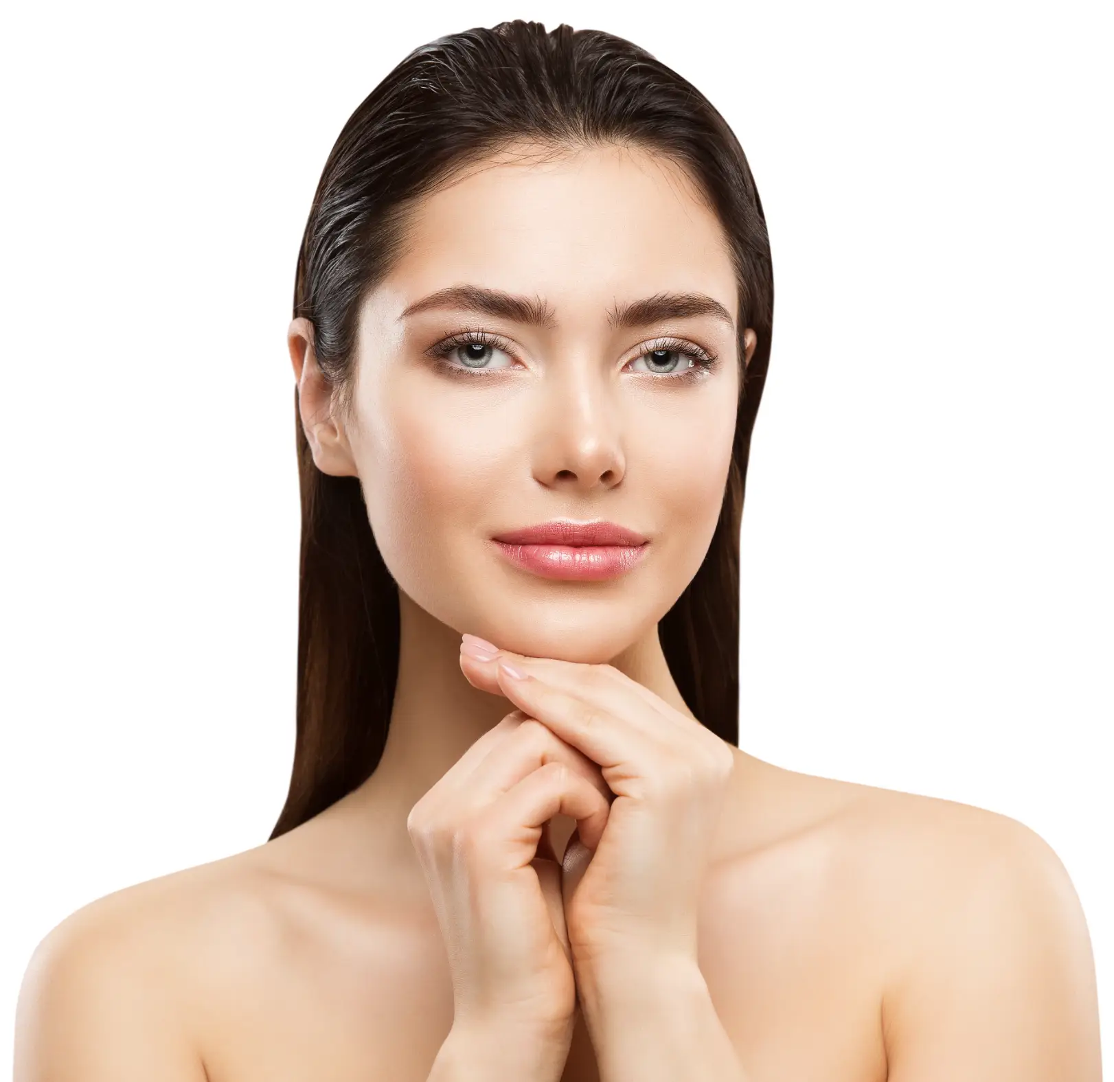 Woman with dark hair faces forward with her hands resting beneath her chin against a white background.
